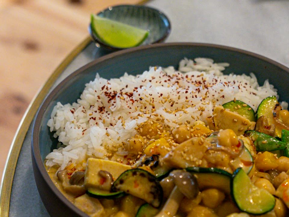 Coconut curry with vegetables over rice